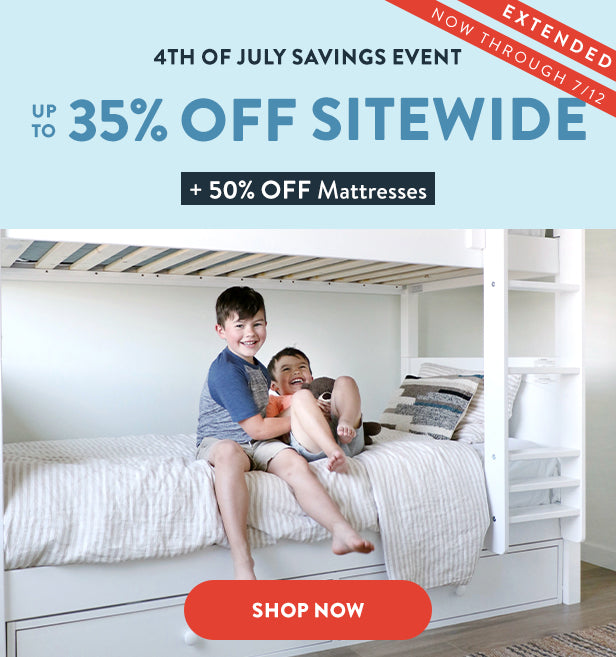 Two boys sitting on the bottom bunk bed laughing with a banner above them which reads "4th of July Savings Event Up to 35% Off Sitewide + 50% Off Mattresses" with a CTA button Below reading "Shop Now"